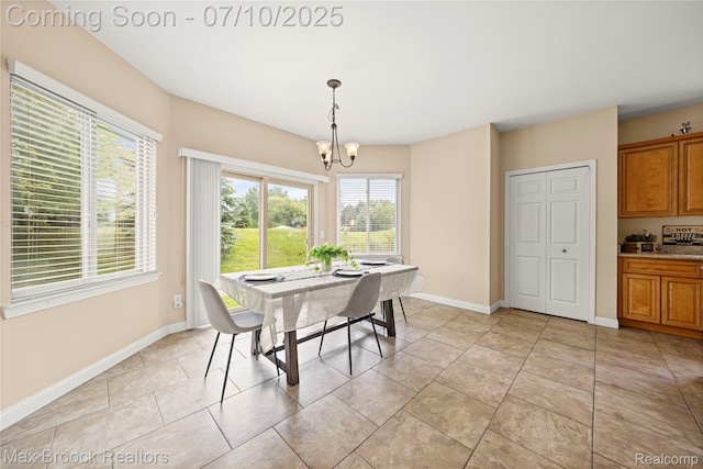 5142 Trailwood Ln, Warren, MI 48092 - dining area with a chandelier and baseboards