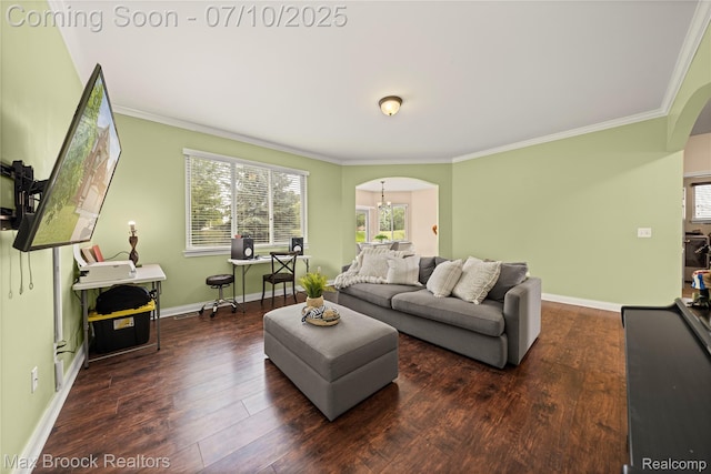 5142 Trailwood Ln, Warren, MI 48092 - living area with arched walkways, crown molding, plenty of natural light, and wood finished floors