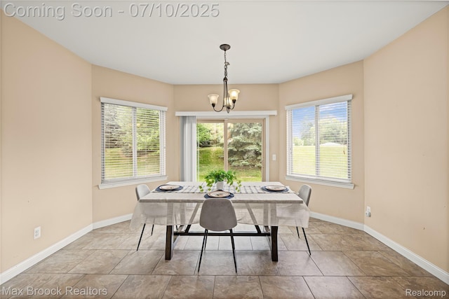 5142 Trailwood Ln, Warren, MI 48092 - dining room featuring a chandelier and baseboards
