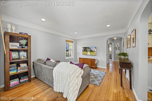 903 Oakridge Ave, Royal Oak, MI 48067 - living area with arched walkways, light wood-style floors, recessed lighting, and crown molding
