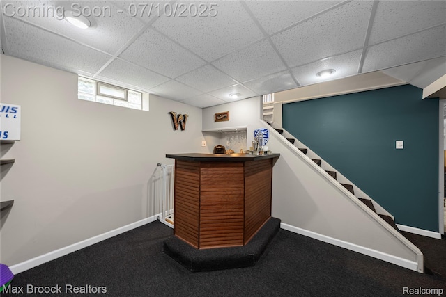 903 Oakridge Ave, Royal Oak, MI 48067 - indoor dry bar featuring a drop ceiling, stairs, and dark carpet