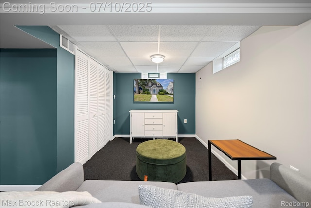 903 Oakridge Ave, Royal Oak, MI 48067 - living area with a drop ceiling and carpet floors