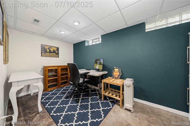903 Oakridge Ave, Royal Oak, MI 48067 - office space featuring concrete flooring, a paneled ceiling, and radiator heating unit