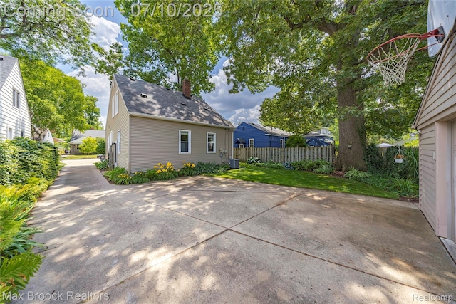 903 Oakridge Ave, Royal Oak, MI 48067 - back of house with a chimney and a patio area