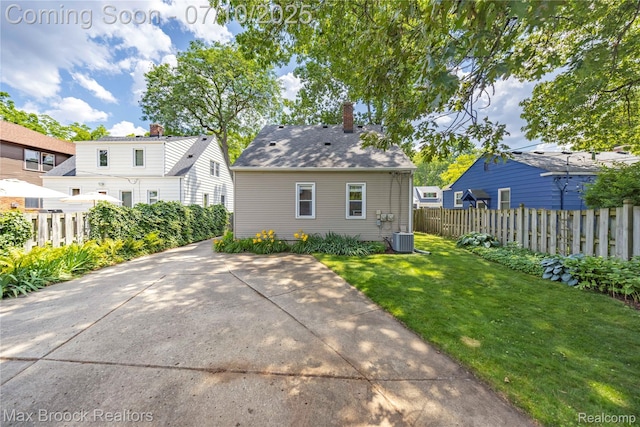 903 Oakridge Ave, Royal Oak, MI 48067 - rear view of house featuring a patio and a chimney