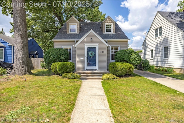 903 Oakridge Ave, Royal Oak, MI 48067 - new england style home featuring roof with shingles