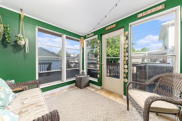 411 Edgemoor Ave, Kalamazoo, MI 49001 - sunroom with plenty of natural light and track lighting