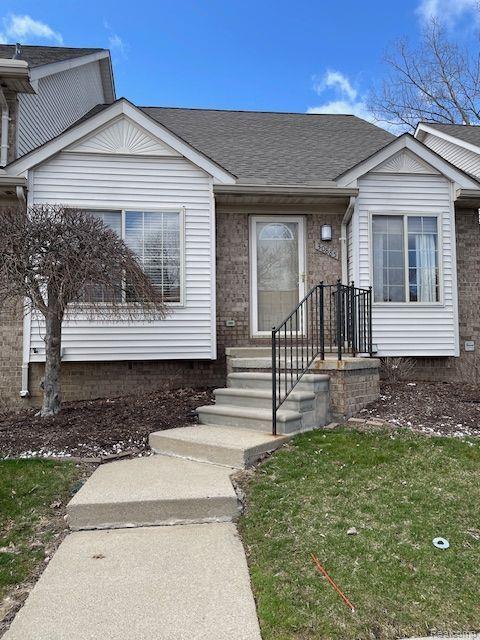 30885 Lee Frank Ln, Madison Heights, MI 48071 - view of front of property with a shingled roof