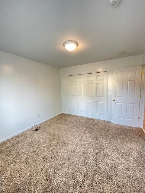 30885 Lee Frank Ln, Madison Heights, MI 48071 - unfurnished bedroom with a closet and carpet floors