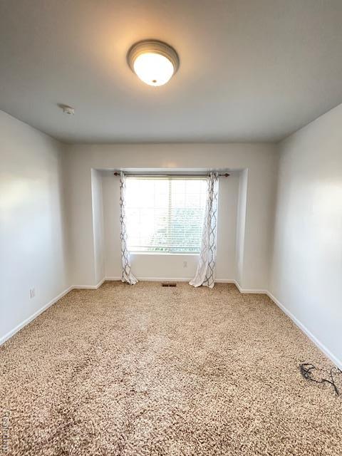 30885 Lee Frank Ln, Madison Heights, MI 48071 - empty room featuring carpet and baseboards