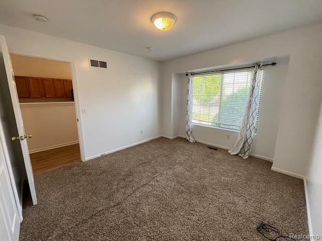 30885 Lee Frank Ln, Madison Heights, MI 48071 - empty room with carpet floors and a smoke detector