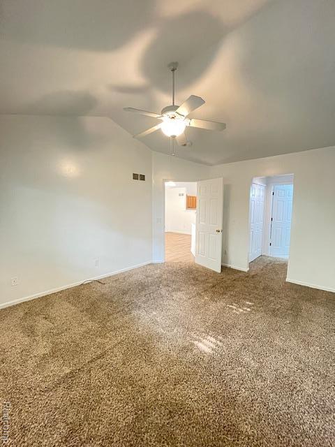 30885 Lee Frank Ln, Madison Heights, MI 48071 - unfurnished room featuring ceiling fan, vaulted ceiling, and carpet