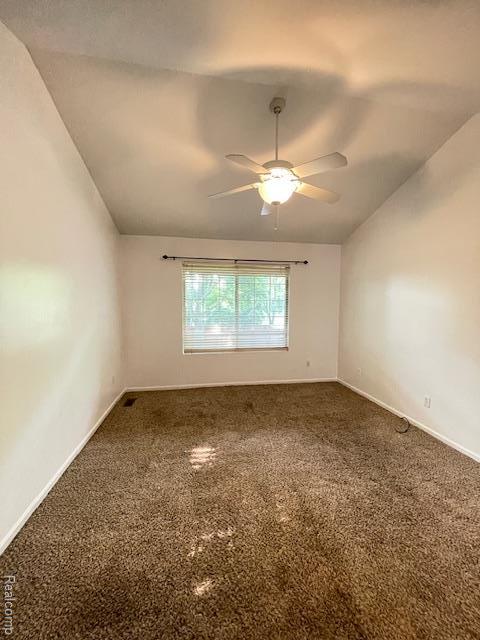 30885 Lee Frank Ln, Madison Heights, MI 48071 - carpeted spare room with ceiling fan and lofted ceiling
