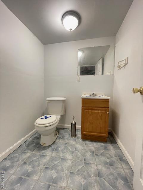30885 Lee Frank Ln, Madison Heights, MI 48071 - half bathroom featuring vanity and toilet