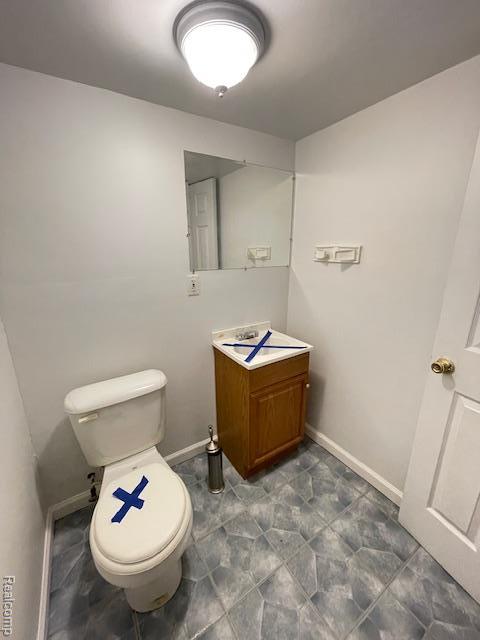 30885 Lee Frank Ln, Madison Heights, MI 48071 - half bathroom with toilet and baseboards