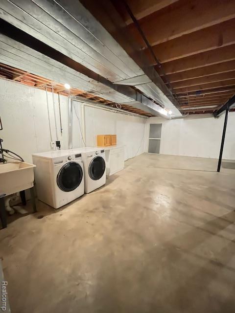30885 Lee Frank Ln, Madison Heights, MI 48071 - unfinished below grade area featuring washer and dryer and a sink