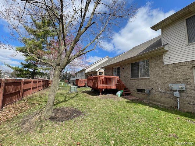 30885 Lee Frank Ln, Madison Heights, MI 48071 - view of yard with a wooden deck