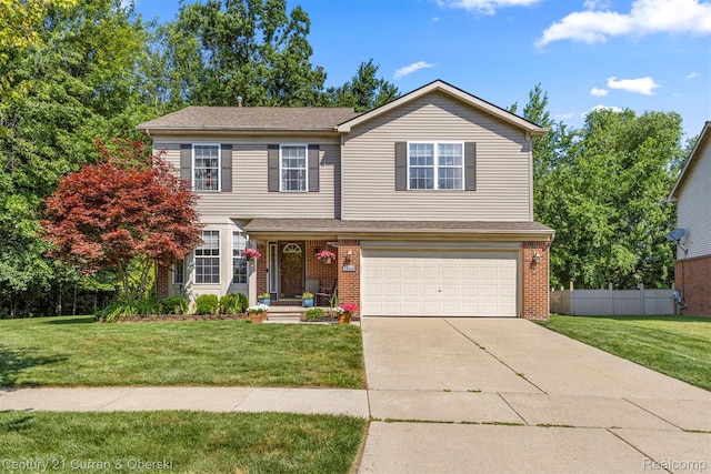 29520 Hunter St, Trenton, MI 48183 - view of front of home featuring an attached garage, driveway, and brick siding