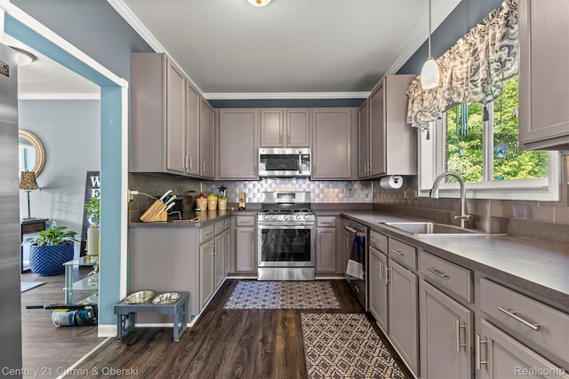29520 Hunter St, Trenton, MI 48183 - kitchen featuring stainless steel appliances, dark wood-style floors, ornamental molding, and gray cabinets