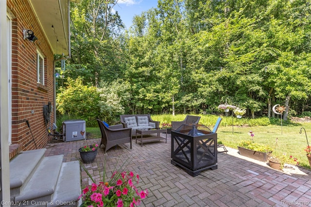 29520 Hunter St, Trenton, MI 48183 - view of patio / terrace featuring an outdoor living space with a fire pit