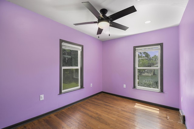 1211 S Jackson St, Jackson, MI 49203 - empty room with wood-type flooring, ceiling fan, and recessed lighting