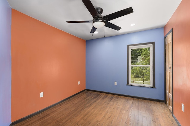 1211 S Jackson St, Jackson, MI 49203 - unfurnished room with ceiling fan, hardwood / wood-style flooring, and recessed lighting