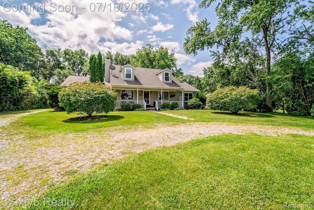 4375 Island Park Dr, Waterford, MI 48329 - cape cod home featuring covered porch, a front lawn, and a chimney