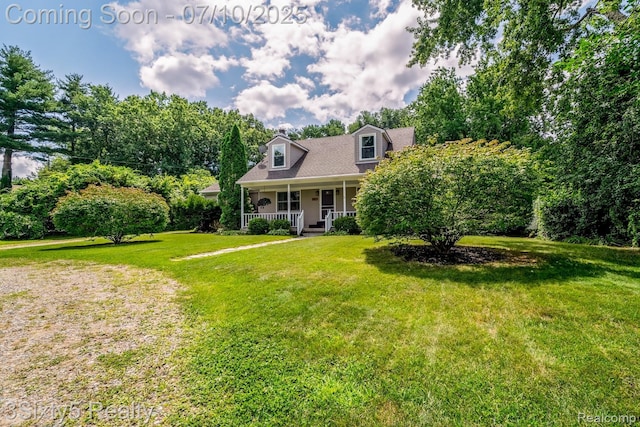 4375 Island Park Dr, Waterford, MI 48329 - cape cod home featuring covered porch and a front lawn