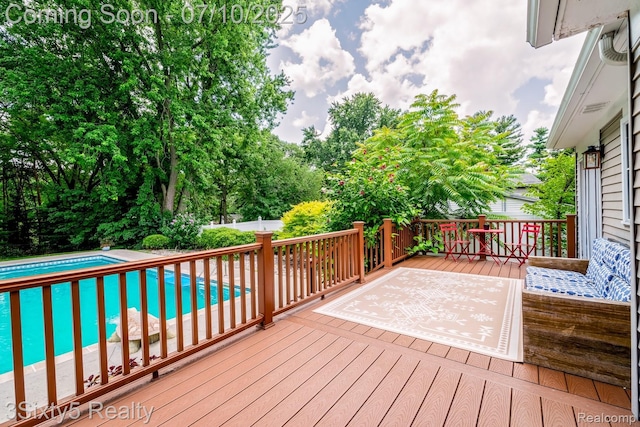 4375 Island Park Dr, Waterford, MI 48329 - wooden terrace featuring an outdoor pool and view of scattered trees