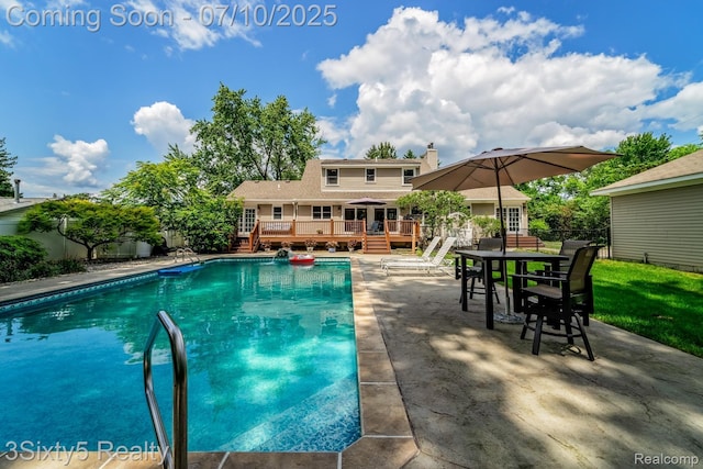 4375 Island Park Dr, Waterford, MI 48329 - outdoor pool with a deck, a patio area, stairs, and outdoor dining space