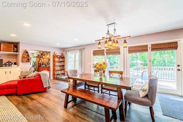 4375 Island Park Dr, Waterford, MI 48329 - dining room with light wood-style floors, recessed lighting, and a chandelier
