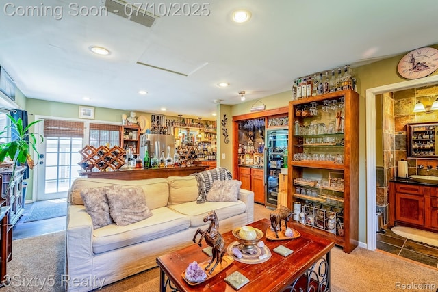 4375 Island Park Dr, Waterford, MI 48329 - carpeted living area with bar area and recessed lighting