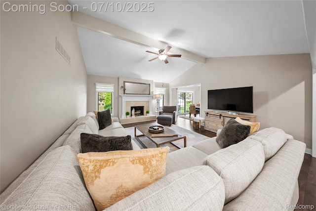 14125 Bangor Dr, Sterling Heights, MI 48313 - living room with wood finished floors, a tile fireplace, and ceiling fan