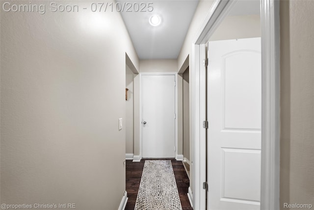 14125 Bangor Dr, Sterling Heights, MI 48313 - hall featuring dark wood-style floors and baseboards