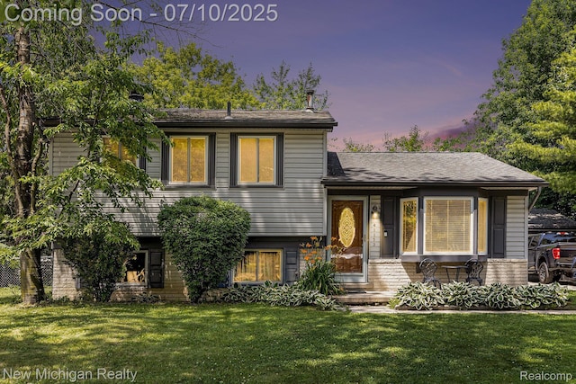41173 Cimarron St, Clinton Township, MI 48038 - split level home featuring a lawn