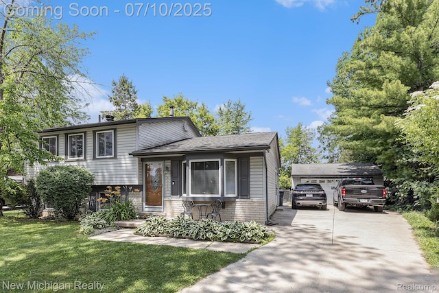 41173 Cimarron St, Clinton Township, MI 48038 - split level home featuring a front yard and brick siding