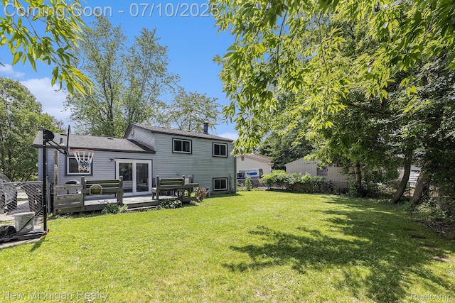 41173 Cimarron St, Clinton Township, MI 48038 - rear view of house featuring a deck and a chimney