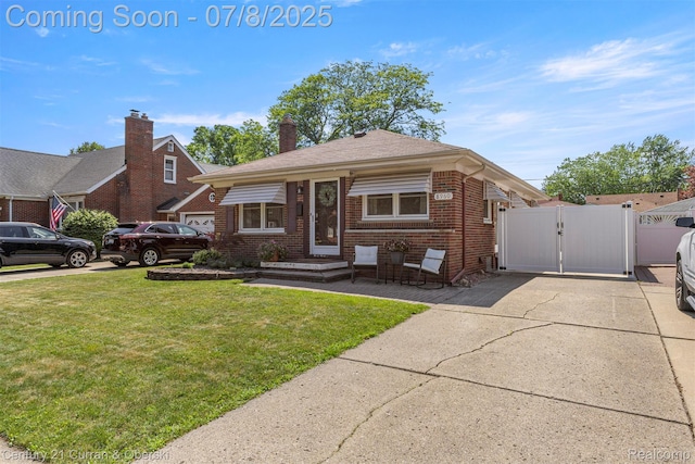 8960 Niver Ave, Allen Park, MI 48101 - view of front of home with a gate and brick siding