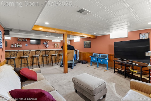 8960 Niver Ave, Allen Park, MI 48101 - carpeted living room with recessed lighting, bar area, wainscoting, and wood walls