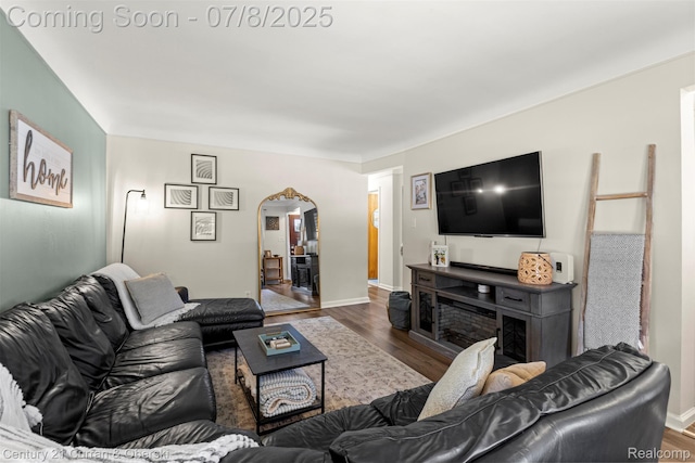 8960 Niver Ave, Allen Park, MI 48101 - living area with wood finished floors and arched walkways