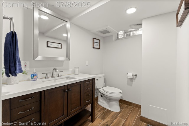 8960 Niver Ave, Allen Park, MI 48101 - bathroom with double vanity, wood finished floors, and recessed lighting