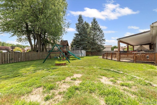 22031 Birch St, Woodhaven, MI 48183 - fenced backyard featuring a playground