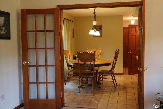 13578 Strasburg Rd, La Salle, MI 48145 - dining area with light tile patterned flooring and baseboards