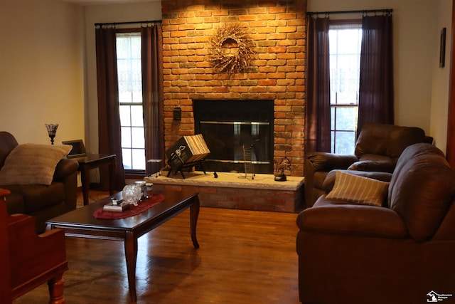 13578 Strasburg Rd, La Salle, MI 48145 - living area with wood finished floors and a fireplace