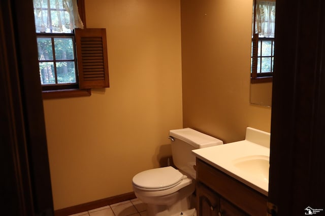 13578 Strasburg Rd, La Salle, MI 48145 - half bathroom with vanity and tile patterned floors