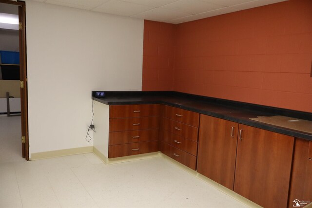 13578 Strasburg Rd, La Salle, MI 48145 - bar area featuring baseboards and light floors