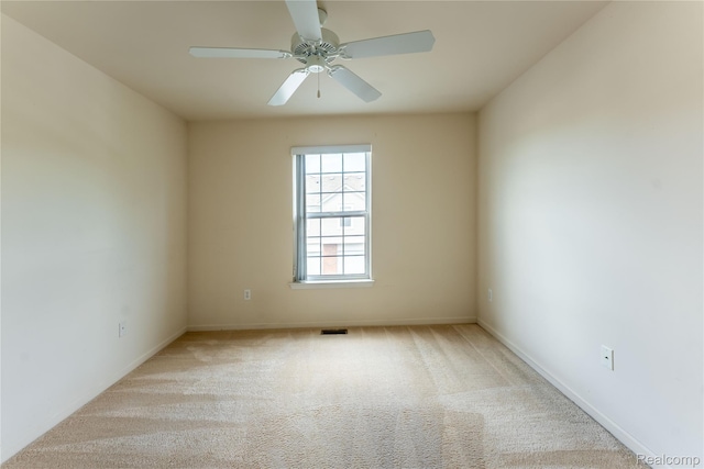 2165 Leighton Dr, Shelby Twp, MI 48317 - carpeted spare room featuring a ceiling fan and baseboards