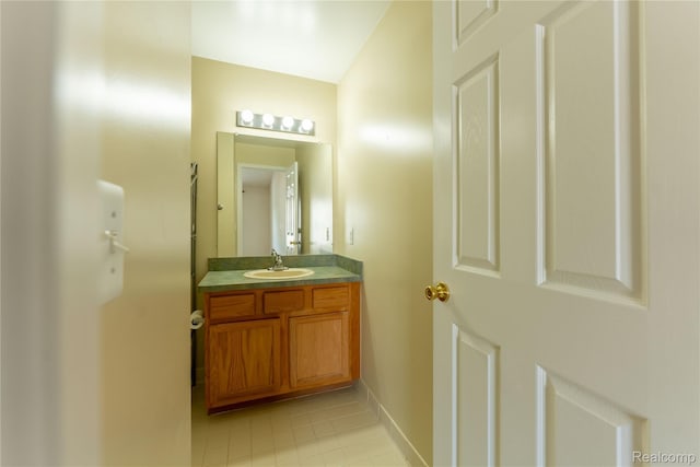 2165 Leighton Dr, Shelby Twp, MI 48317 - bathroom with vanity and tile patterned flooring