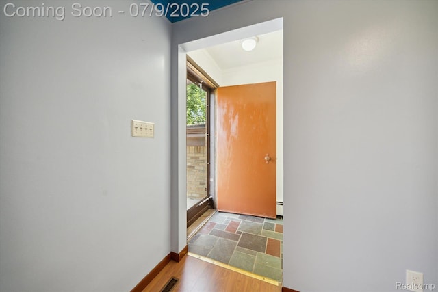 30590 Lorraine Ave, Warren, MI 48093 - hall with stone finish flooring and a baseboard radiator