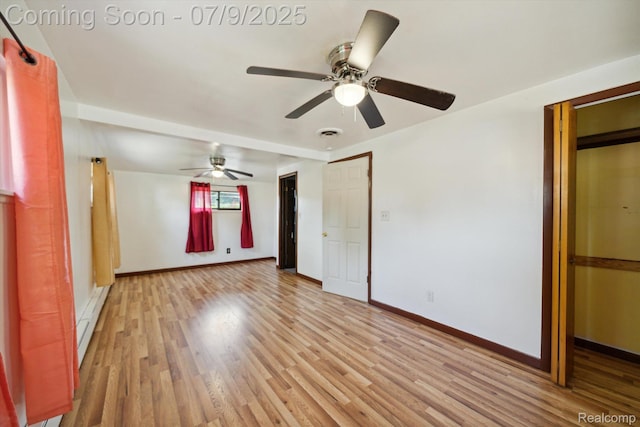 30590 Lorraine Ave, Warren, MI 48093 - unfurnished bedroom with a baseboard radiator, light wood-style floors, and ceiling fan